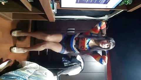 Busty shemale in a sexy outfit is showing off her body