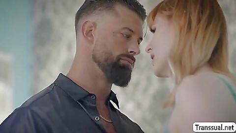 A redhead with a sexy face is getting licked and analed