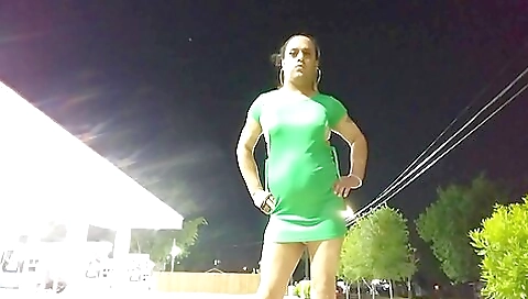 Amateur brunette in outdoor public shows off her ass