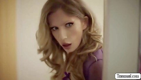 Bare ass blonde wears panties and her legs and ass can be seen